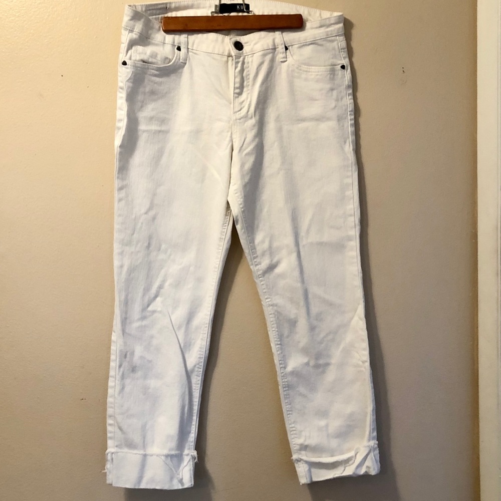 White stretchy denim boyfriend cut frayed jeans